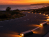 Solar road stud lights glowing on a highway at night, showing energy-efficient LED illumination.