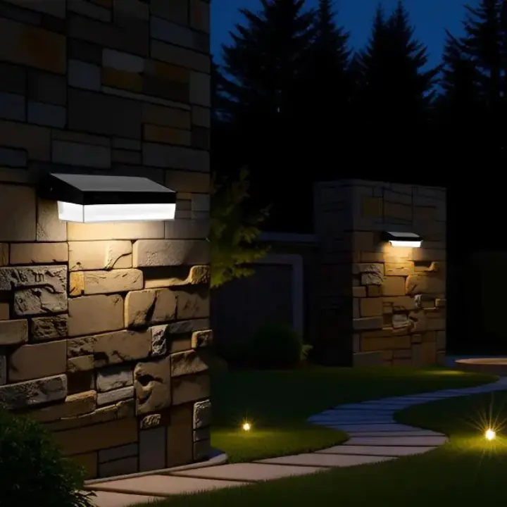 Solar wall lights outdoor illuminating garden pathway at night